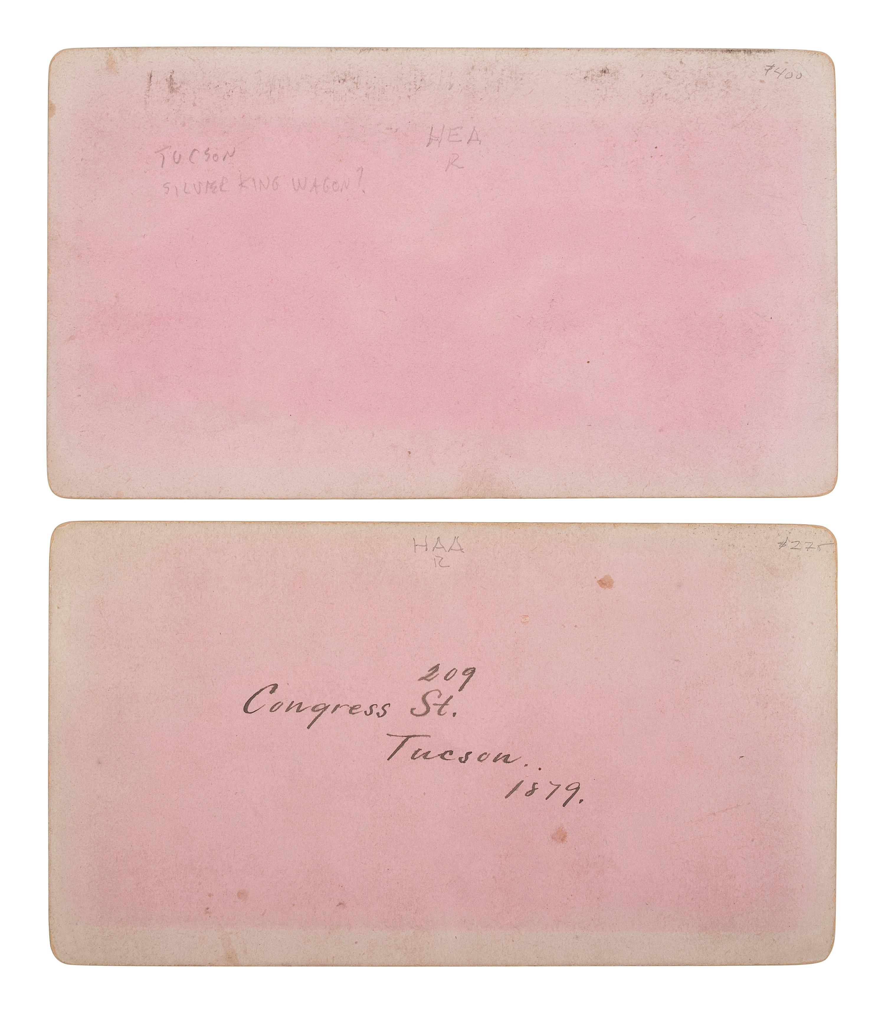 [WESTERN AMERICANA - ARIZONA]. BUEHMAN, Henry (1851-1912), photographer. A group of 2 stereoviews of Tucson, incl. view of Congress Street and horse-drawn ore cart passing through town. Tucson, Arizona Territory, ca 1870s.