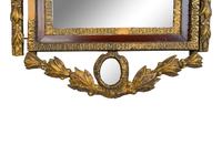 An Italian Baroque Style Giltwood Mirror