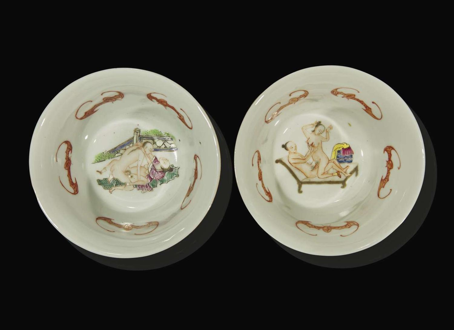 A pair of Chinese faux bois porcelain erotic tea bowls, covers, and stands 仿木紋春宮茶盞兩套