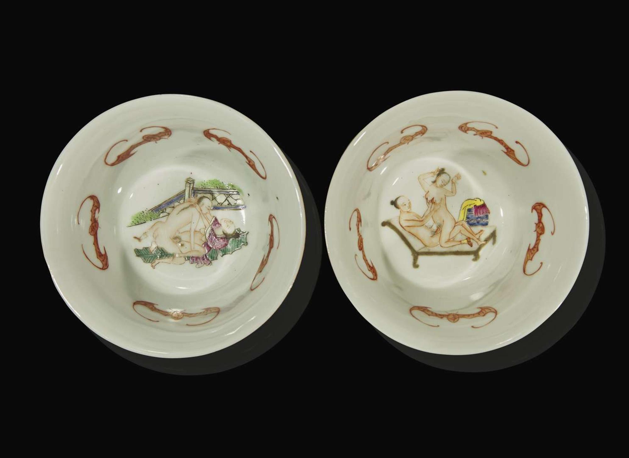 A pair of Chinese faux bois porcelain erotic tea bowls, covers, and stands 仿木紋春宮茶盞兩套
