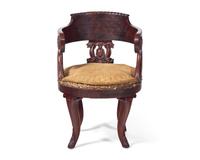 A Classical Carved And Veneered Mahogany Bucket Chair