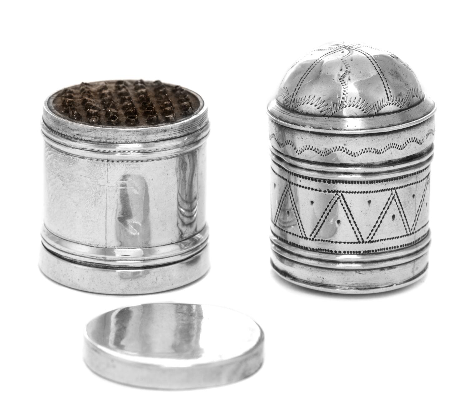 Two English Silver Nutmeg Graters, Maker's Mark Obscured, each of canister form, one having a domed lid with engraved geometric decorat