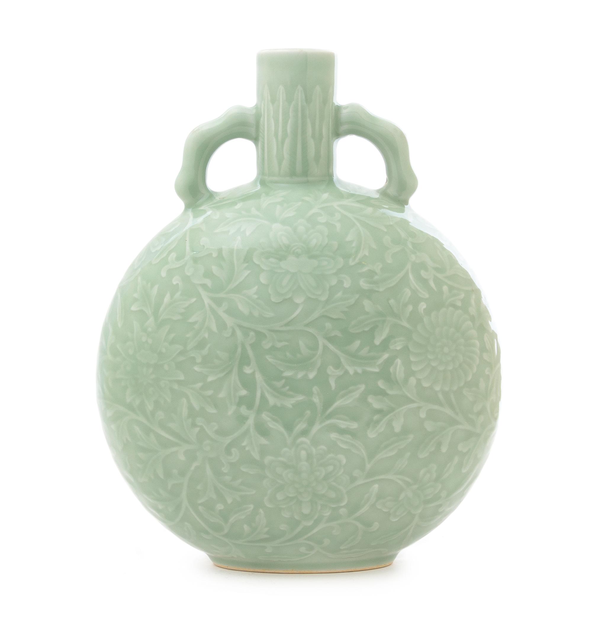 A Celadon Porcelain Moon Flask Height 10 1/2 inches.