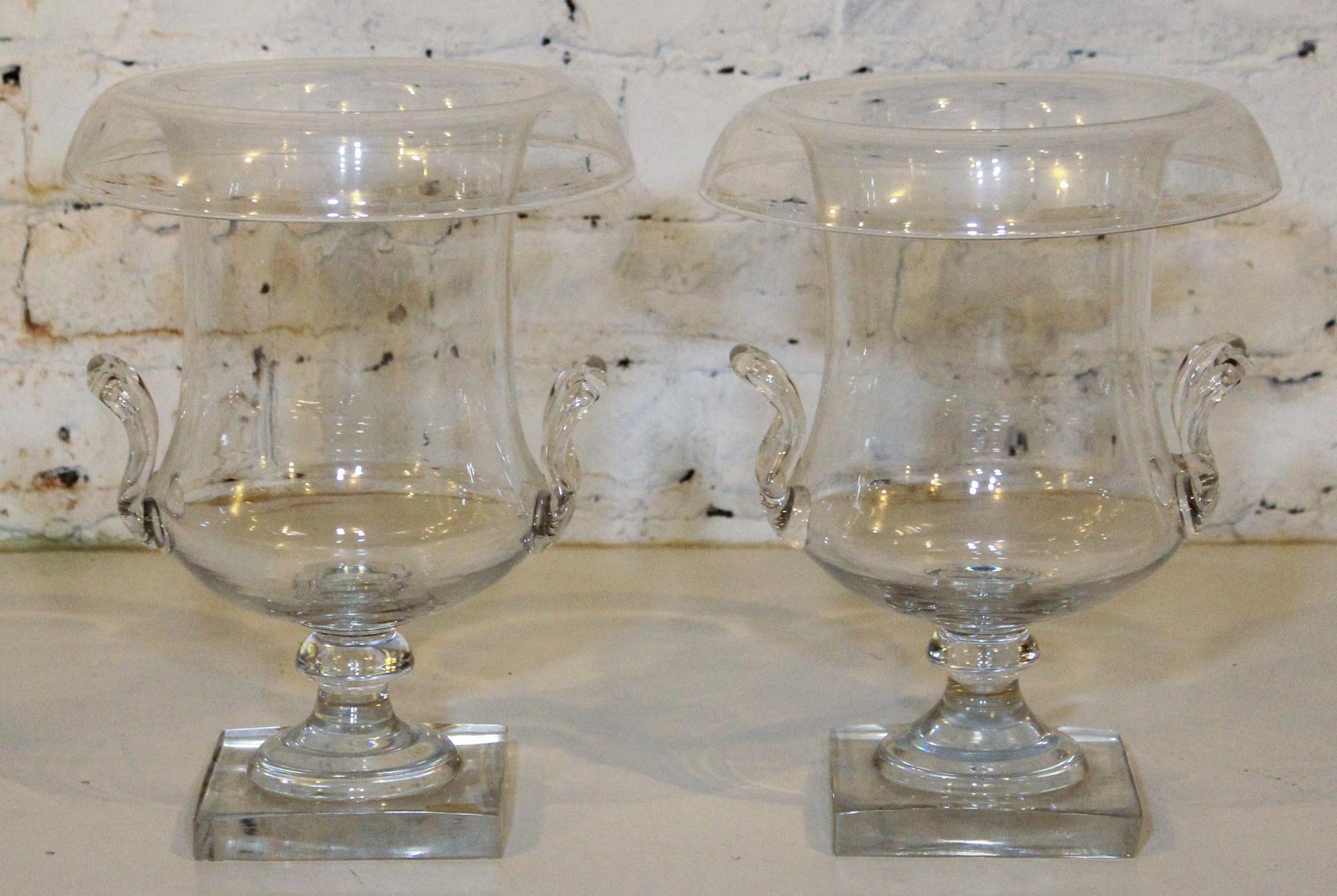 A Pair of Glass Urns.
