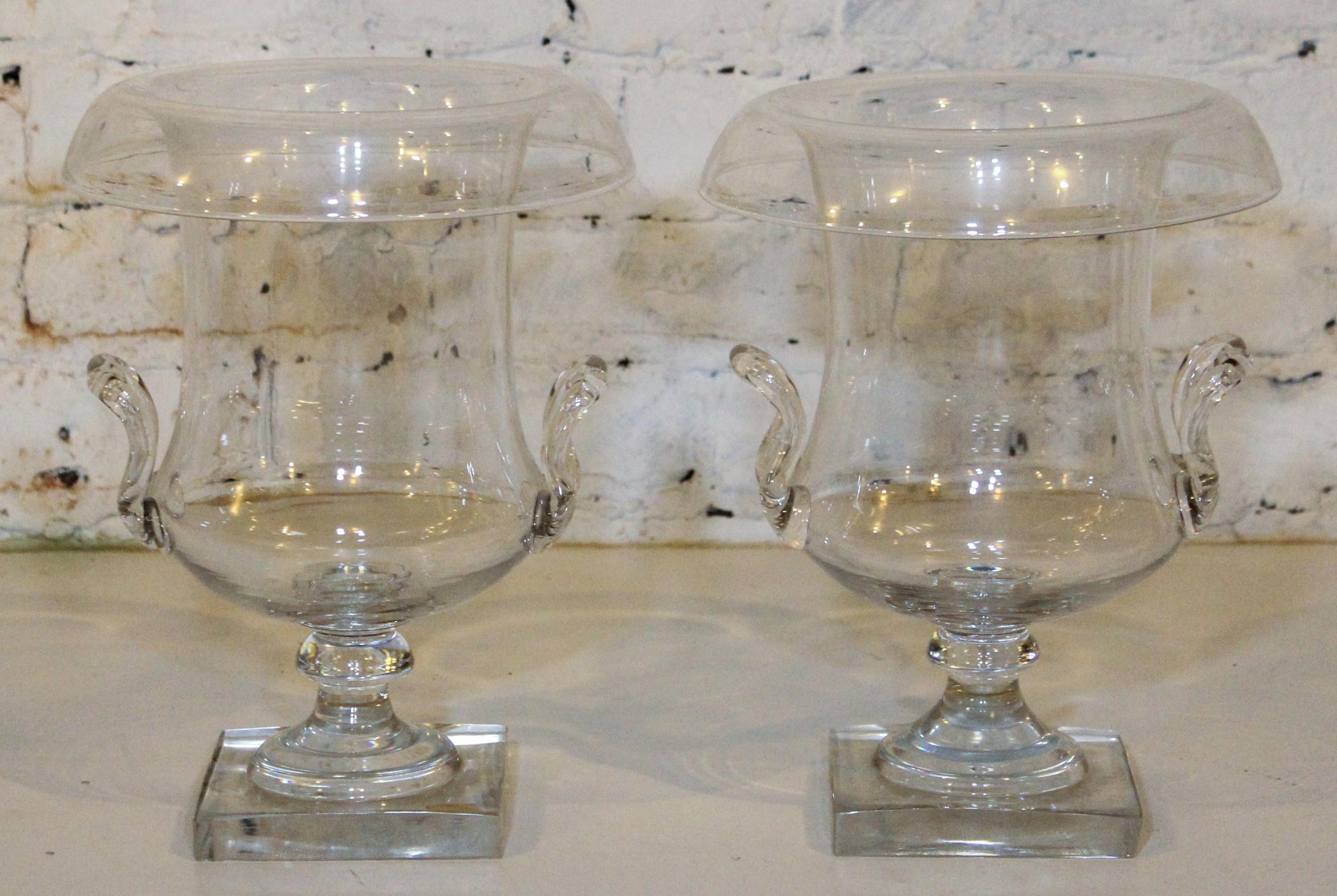 A Pair of Glass Urns.