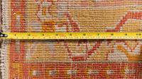 An Oushak Wool Rug