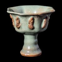A Chinese Longquan Celadon Glazed Porcelain 'Eight Immortals' Stem Cup