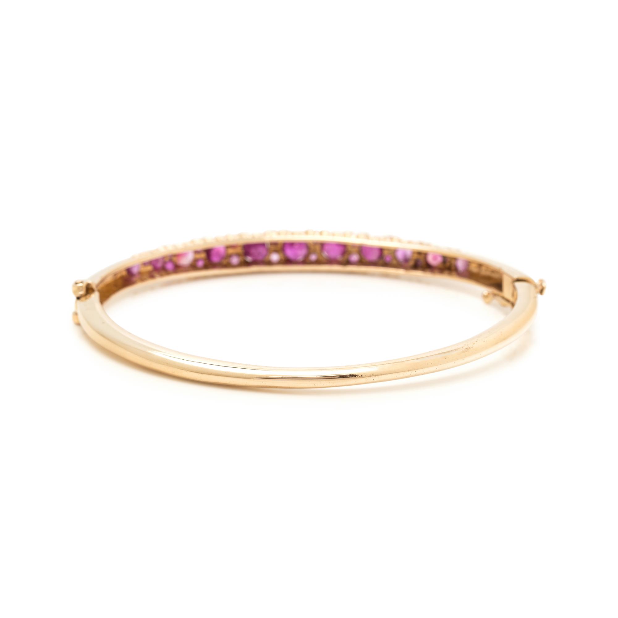 YELLOW GOLD AND RUBY BANGLE BRACELET