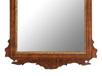 A George III Parcel Gilt Mahogany Mirror