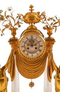 A Louis XV Style Gilt Bronze, Porcelain and Cut Glass Clock Garniture