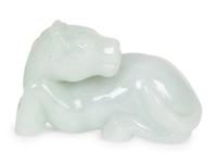 A Collection of Seven Carved Jadeite Figures — 20TH CENTURY
