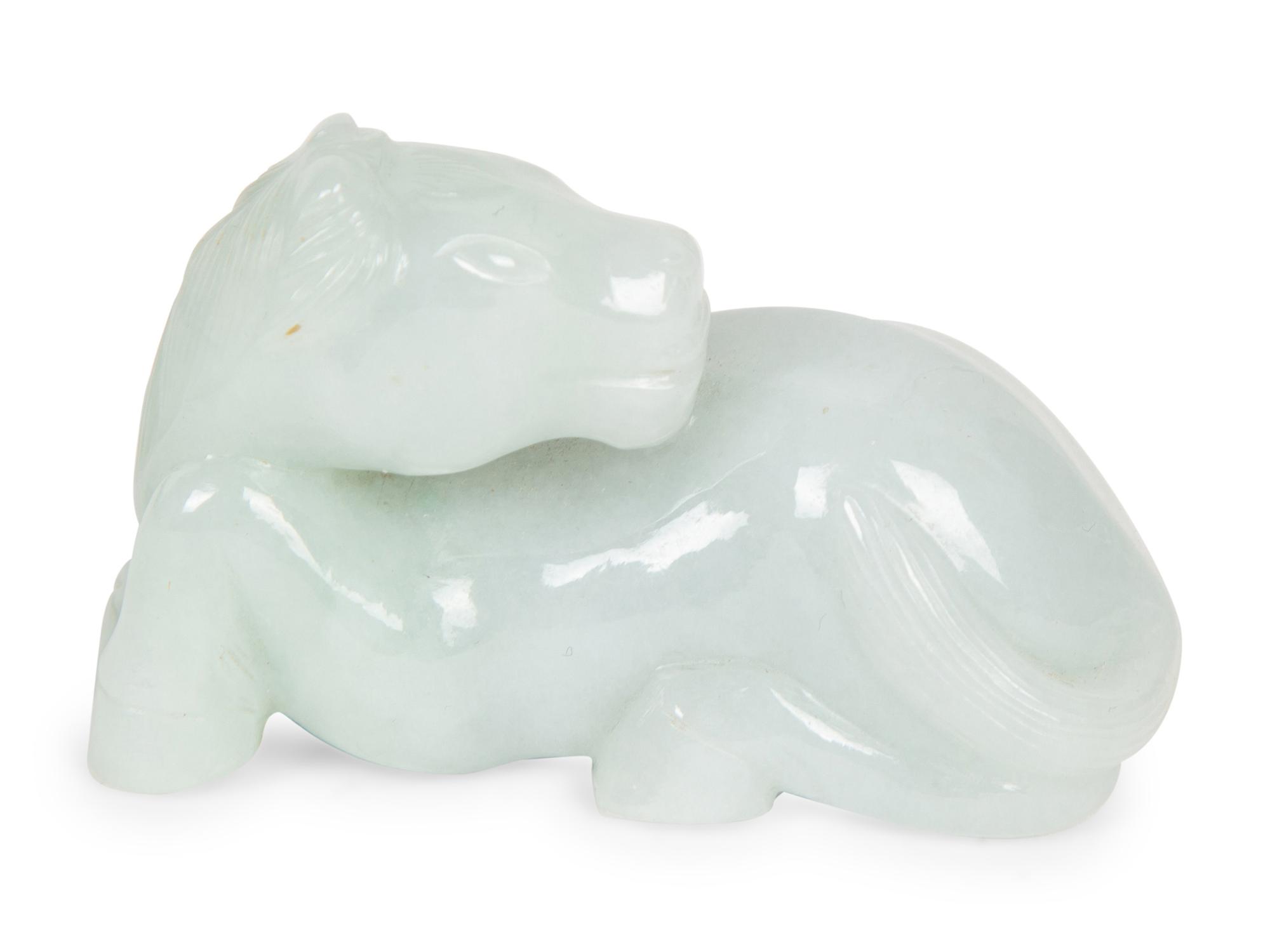 A Collection of Seven Carved Jadeite Figures — 20TH CENTURY
