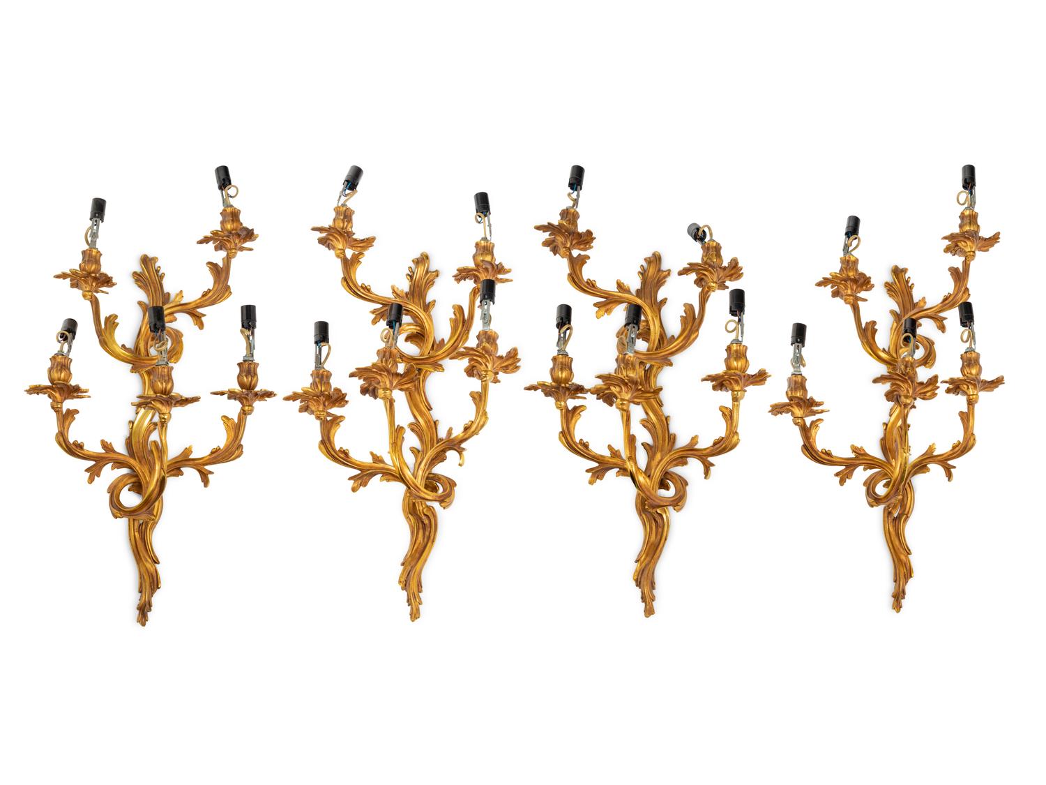 A Set of Four Louis XV Style Gilt Metal Five-Light Sconces