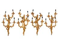A Set of Four Louis XV Style Gilt Metal Five-Light Sconces