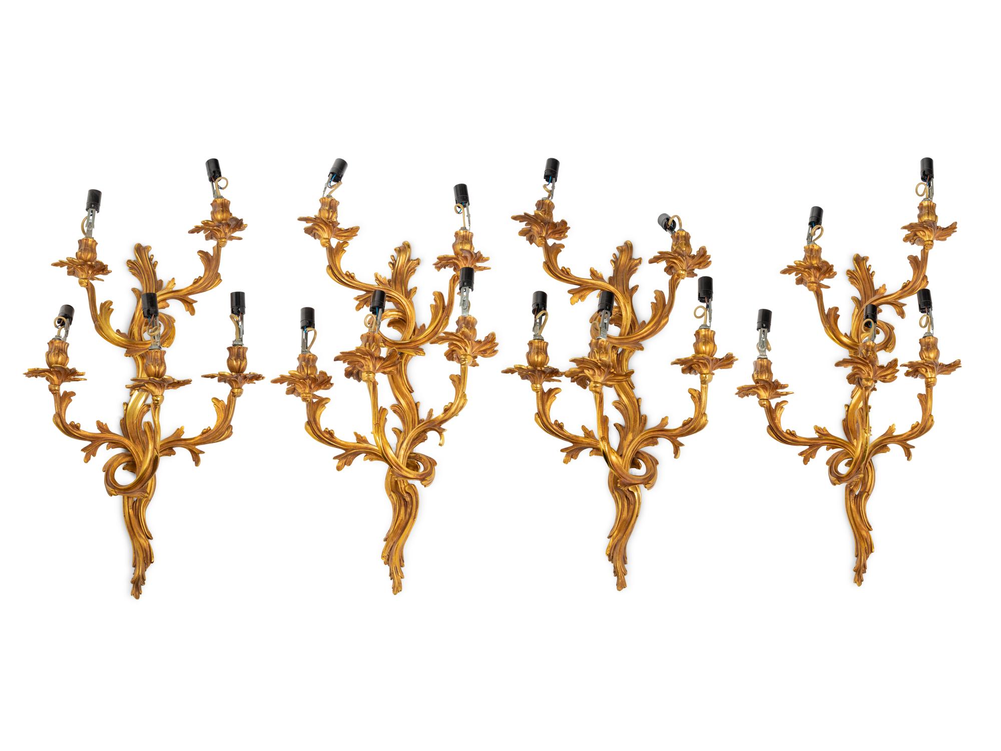 A Set of Four Louis XV Style Gilt Metal Five-Light Sconces