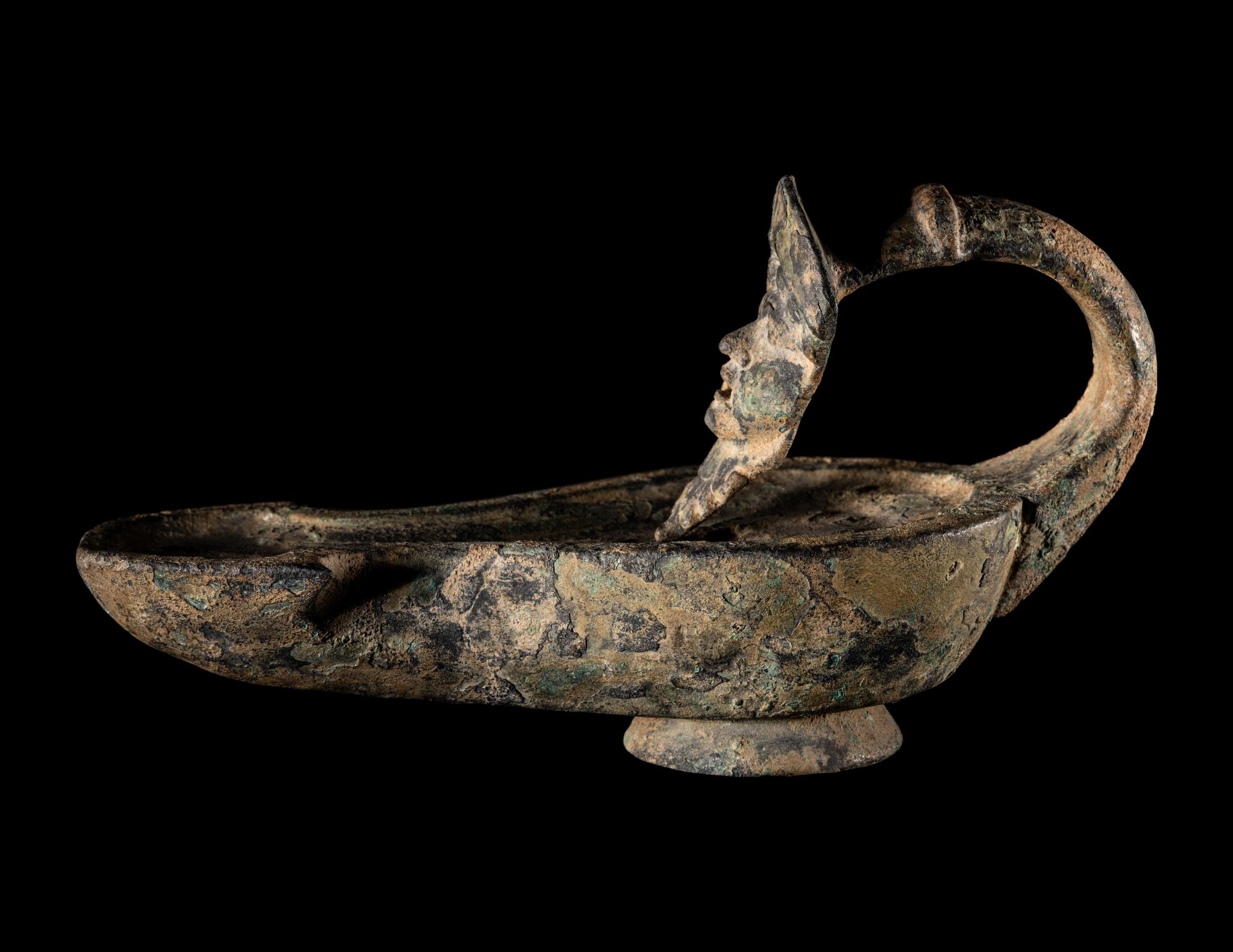 A Roman Bronze Oil Lamp