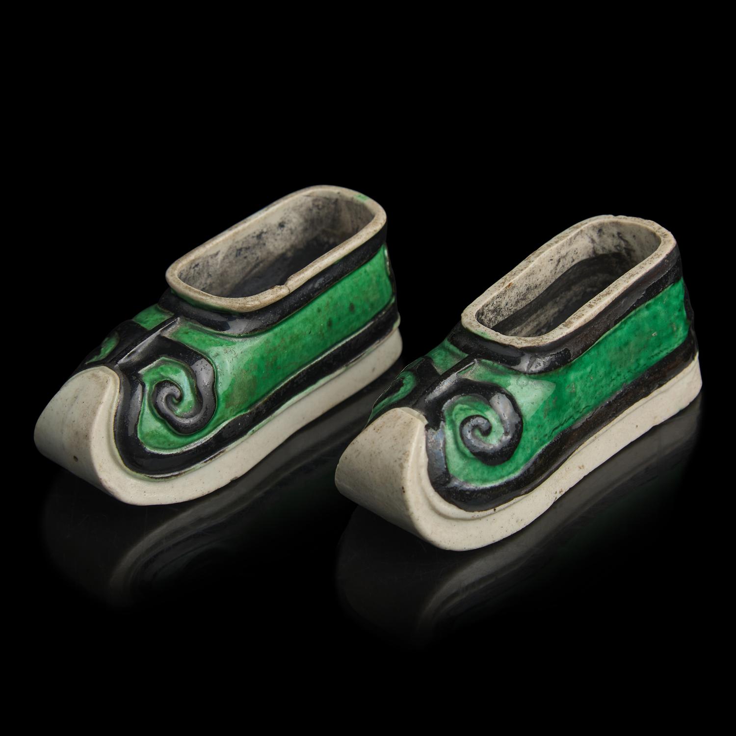 A Pair of Chinese Famille Verte Glazed Biscuit Porcelain "Shoes", 18th Century 清中期 素三彩雕瓷鞋模型一對