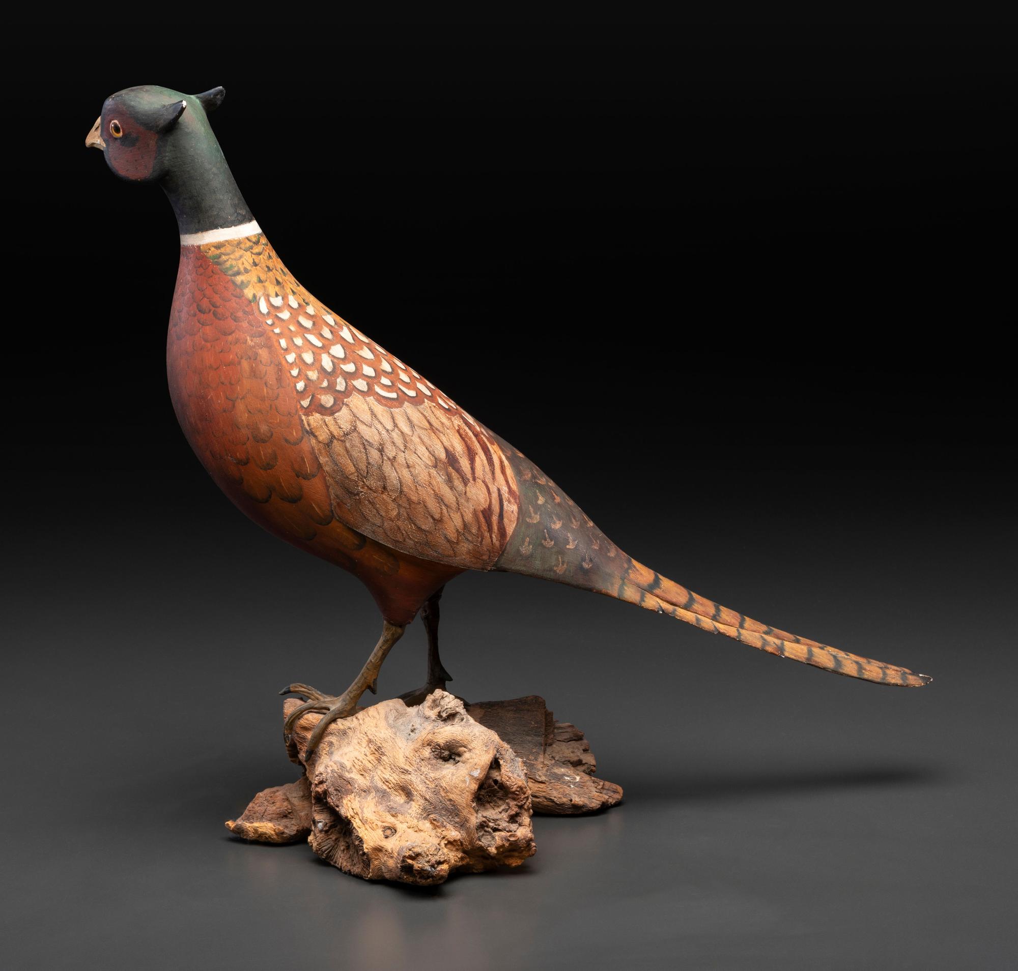 A Carved and Painted Wood Pheasant Decoy