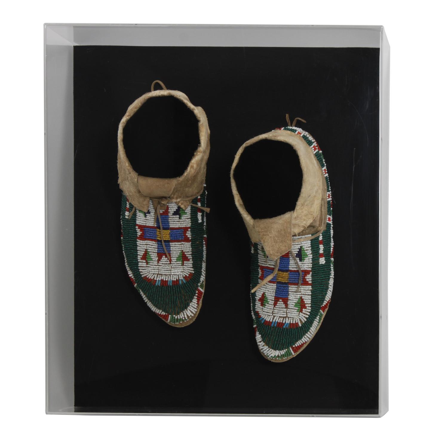 A Pair of Arapahoe Mocassins Length 9 1/2 inches. — CIRCA 1900