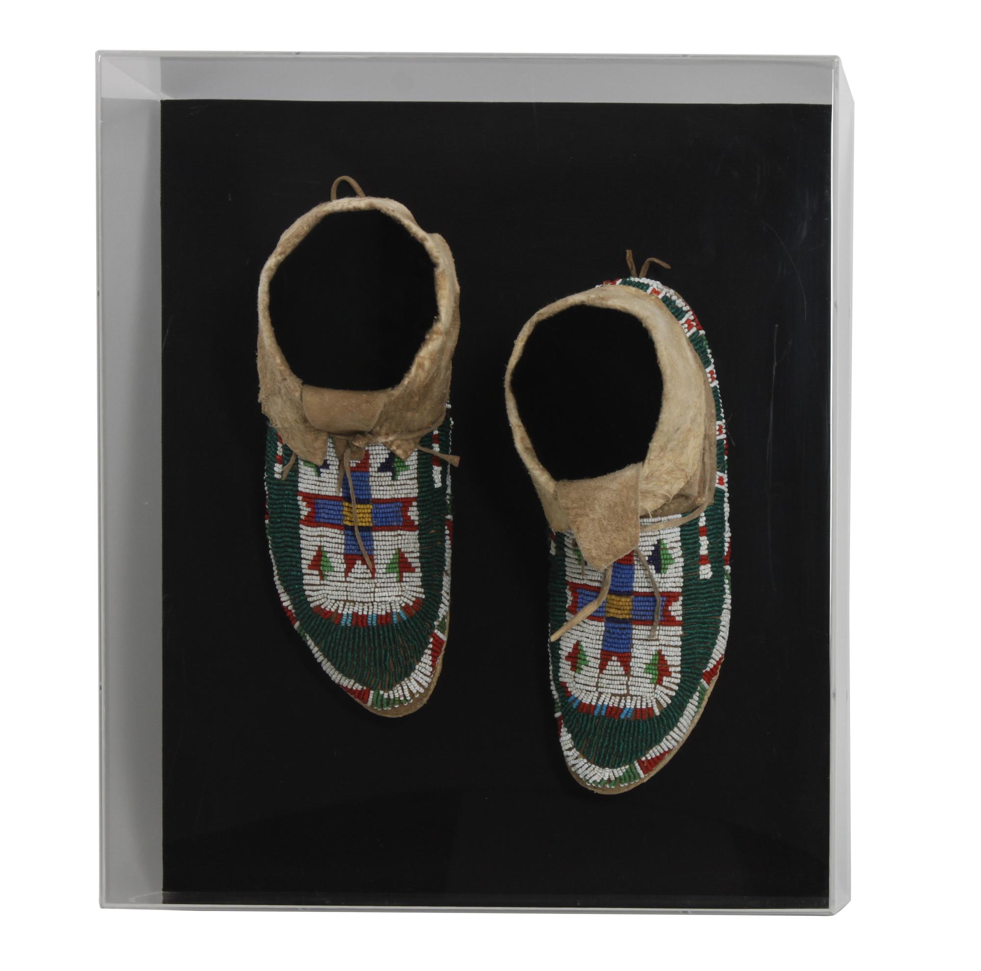 A Pair of Arapahoe Mocassins Length 9 1/2 inches. — CIRCA 1900