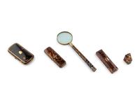 Four Tortoise Shell Mounted Articles