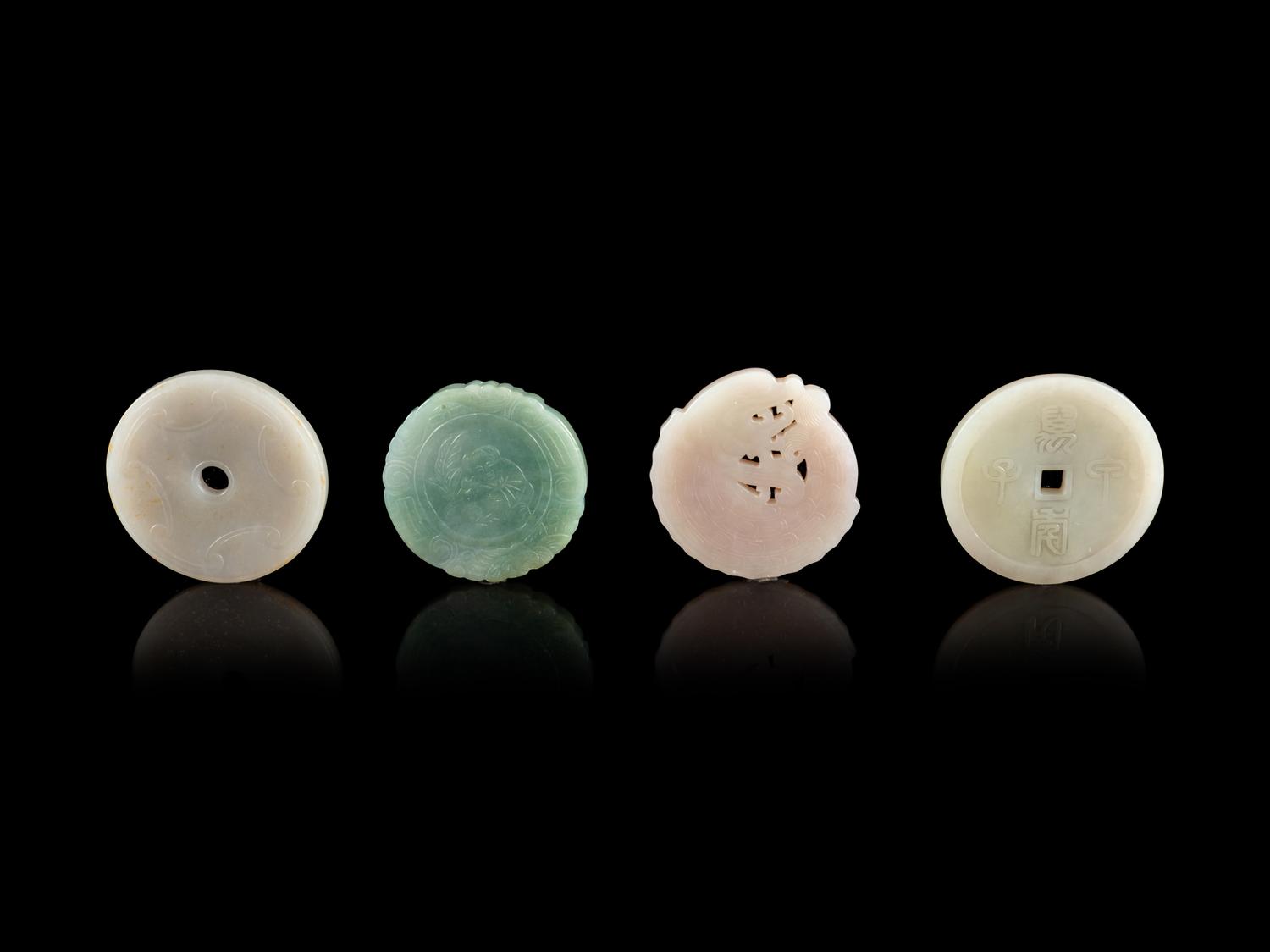 Four Chinese Jade and Jadeite Circular Pendants