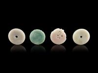 Four Chinese Jade and Jadeite Circular Pendants