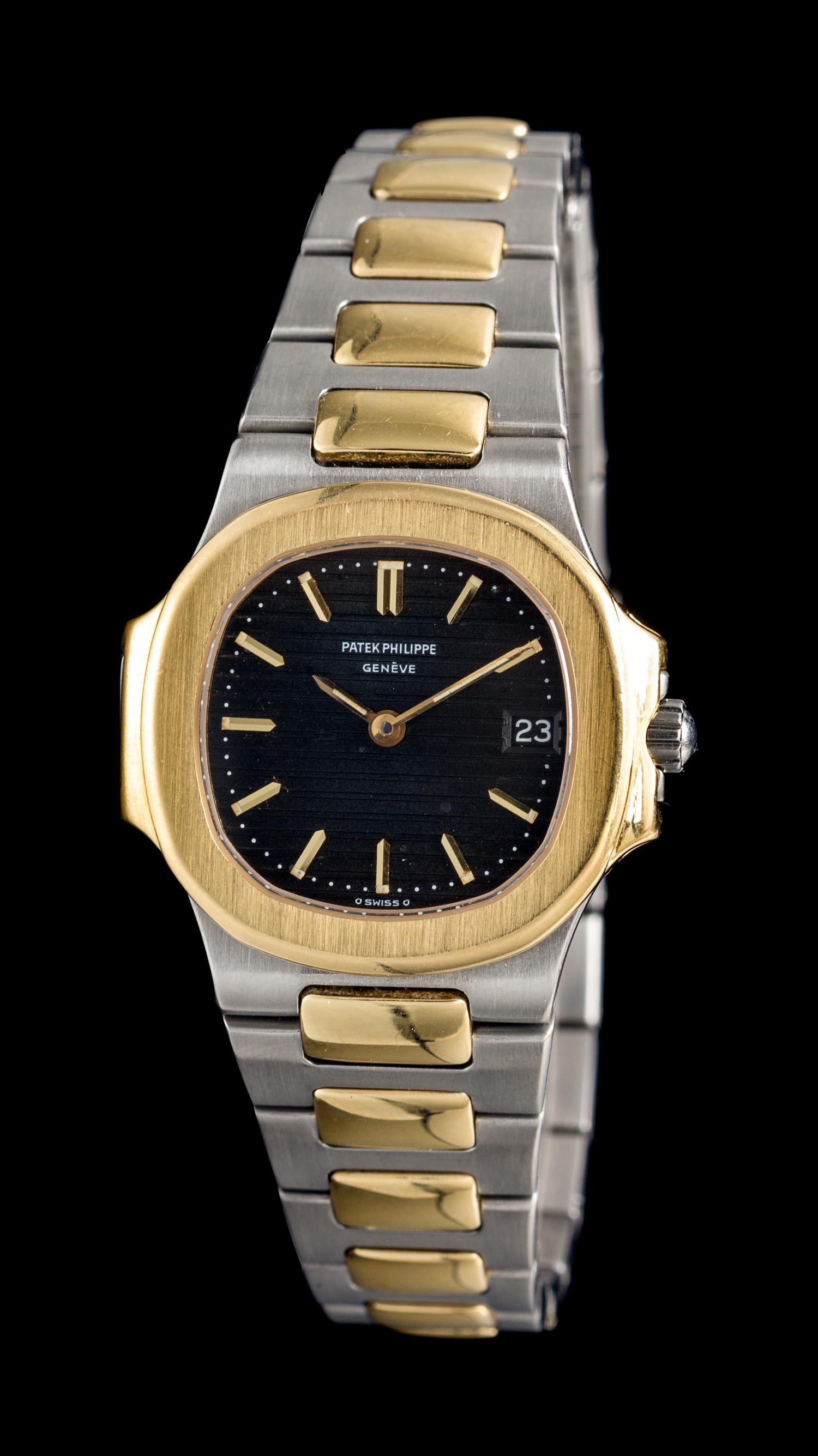 An 18 Karat Yellow Gold and Stainless Steel Ref. 4700 Nautilus Wristwatch, Patek Philippe,