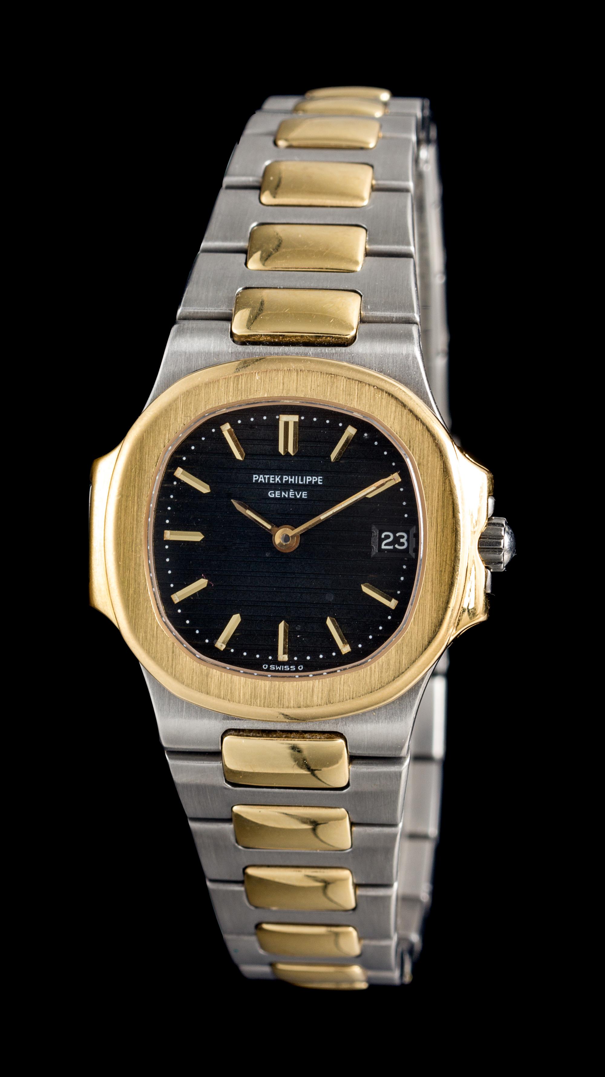 An 18 Karat Yellow Gold and Stainless Steel Ref. 4700 Nautilus Wristwatch, Patek Philippe,
