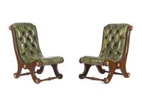A Pair of Late William IV Leather-Upholstered Mahogany Gout Chairs