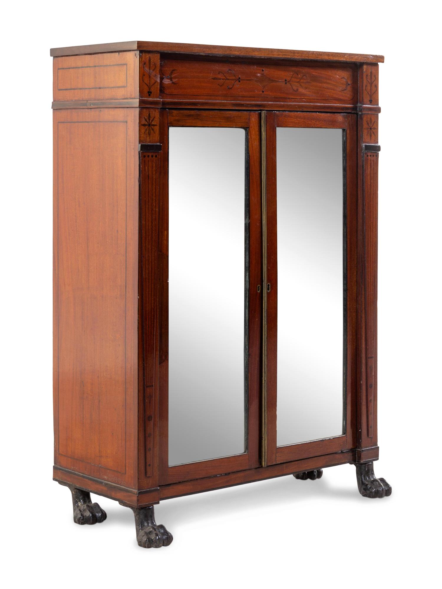 A Victorian Marquetry Cabinet