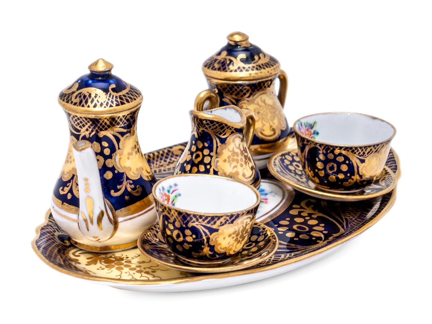 A Miniature Royal Staffordshire Porcelain Seven-Piece Coffee Service