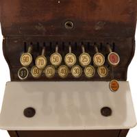 A Cash Register by the National Cash Register Co. 12" W x 15" D x 17.5" H — United States, Early 20th Century