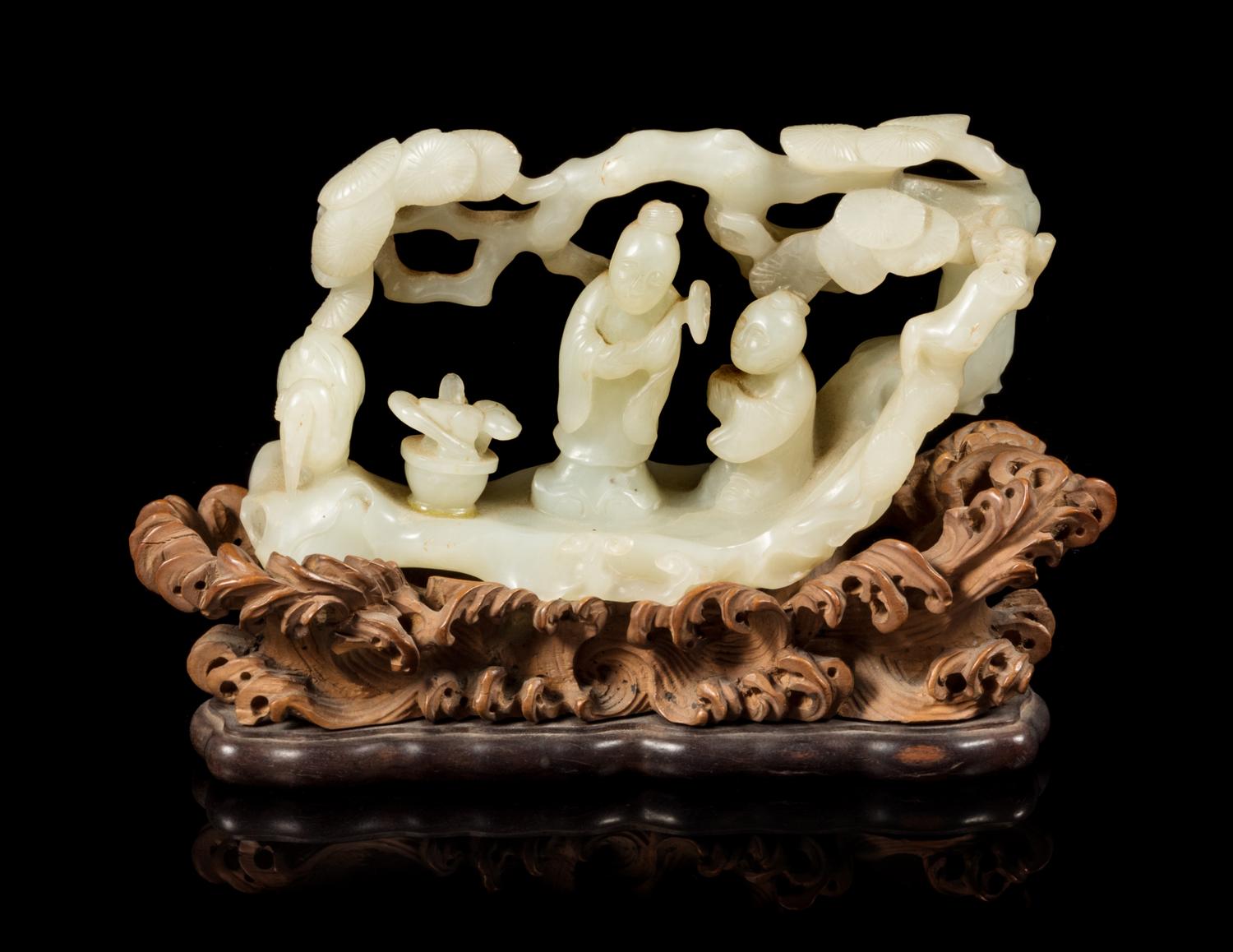 A White Jade Figural Group Length 5 1/2 inches. — 18TH/19TH CENTURY