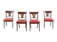 A Set of Four Italian Parcel Gilt Walnut Side Chairs