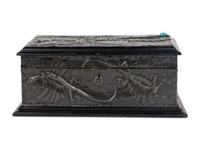 A Repousse Metal and Cabochon-Inset Humidor