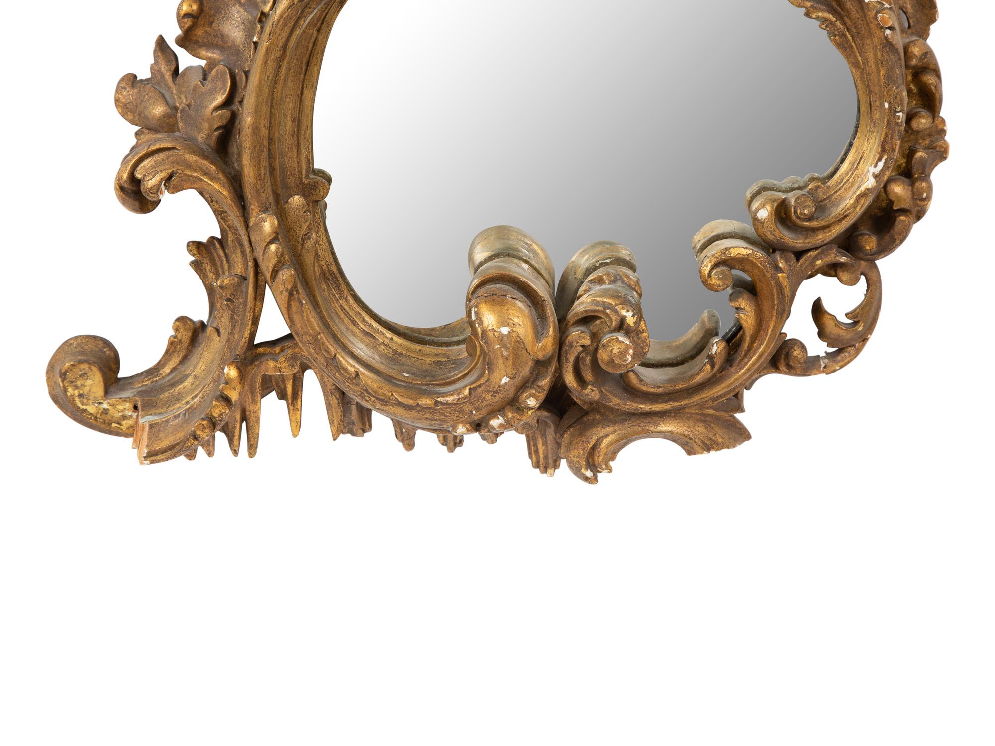 A Pair of Rococo Style Giltwood Mirrors
