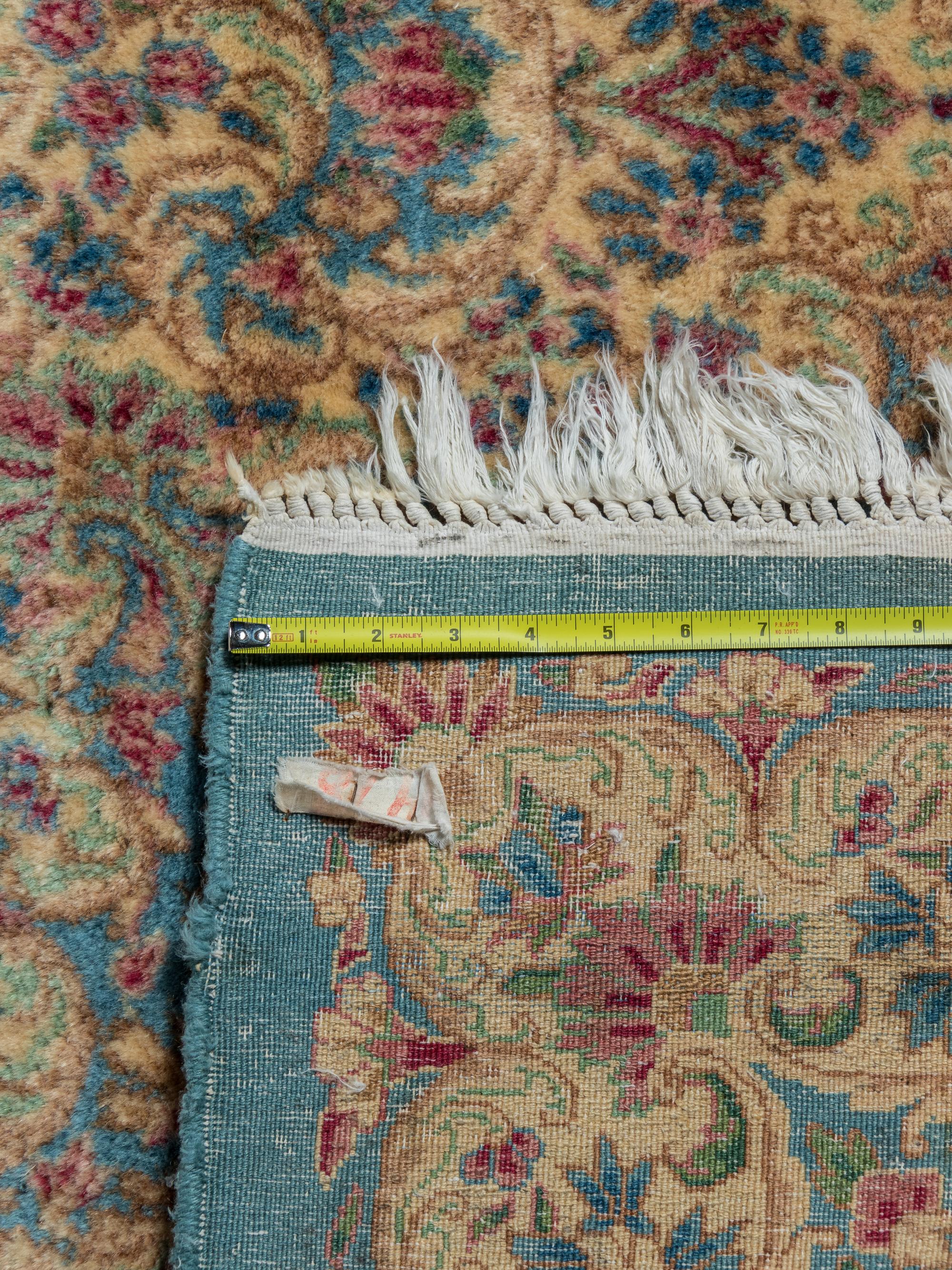 A Kirman Wool Rug
