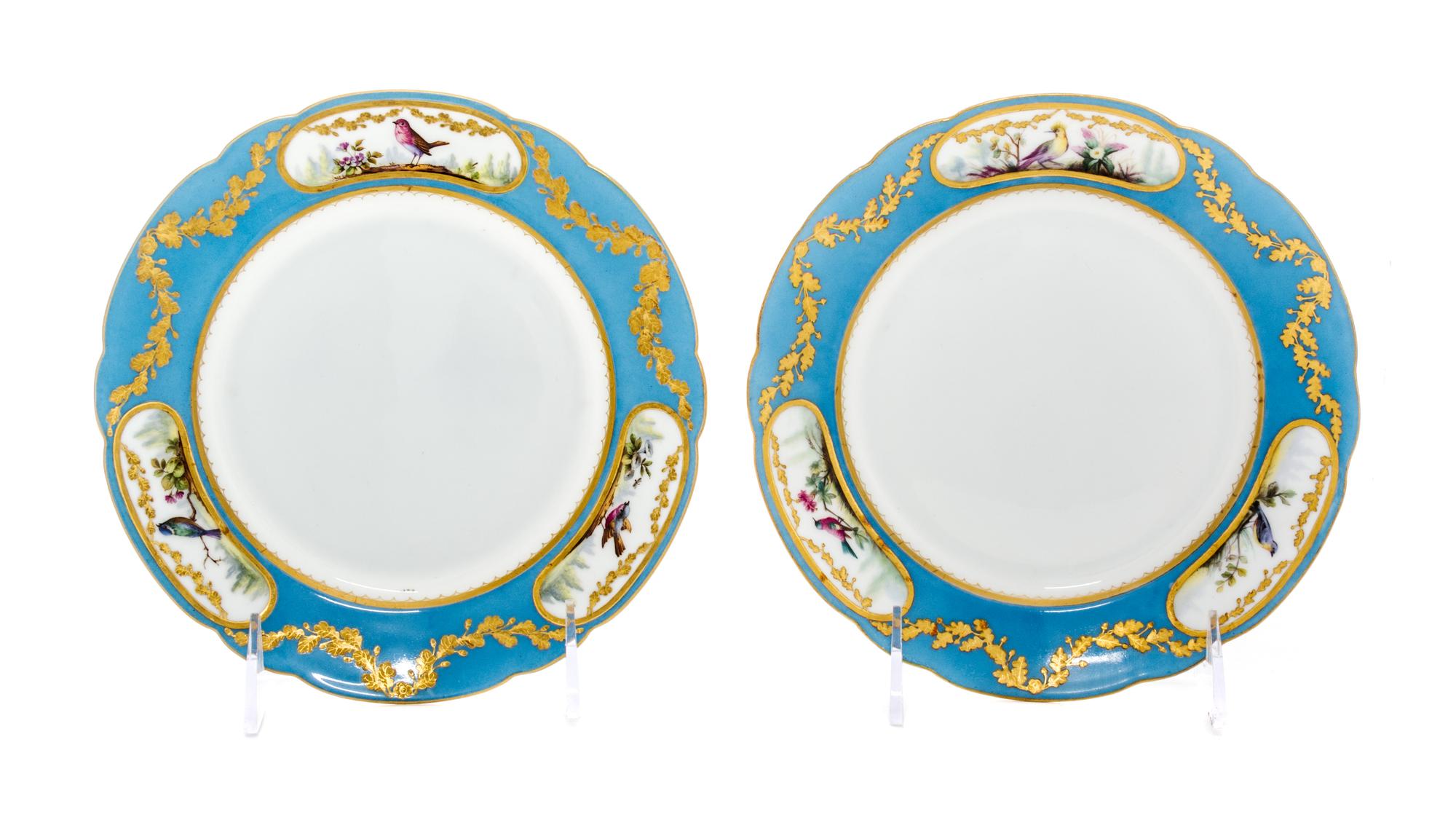 A Set of Russian Porcelain Plates, Imperial Russian Porcelain Factory, Circa 1899, each having a border with three ovals decorated with