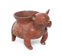 A Pre-Columbian Terracotta Animalier Vessel, Colima, Width 18 1/2 inches.