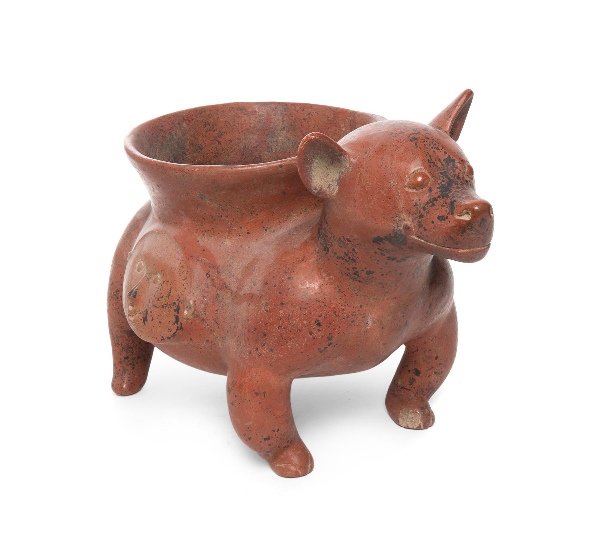 A Pre-Columbian Terracotta Animalier Vessel, Colima, Width 18 1/2 inches.