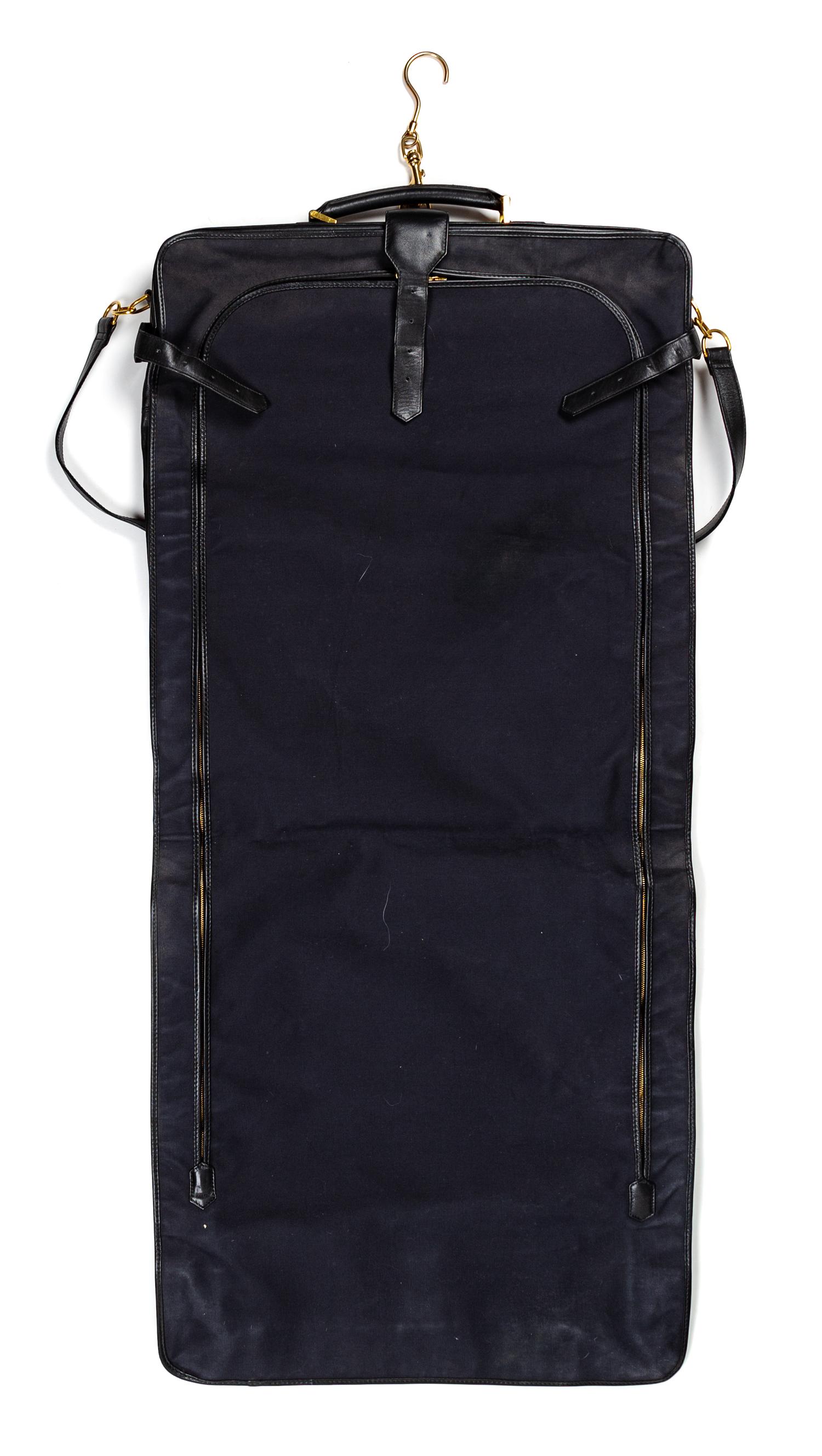 A Chanel Black Lambskin Quilted Garment Bag, 45" L x 24" W.