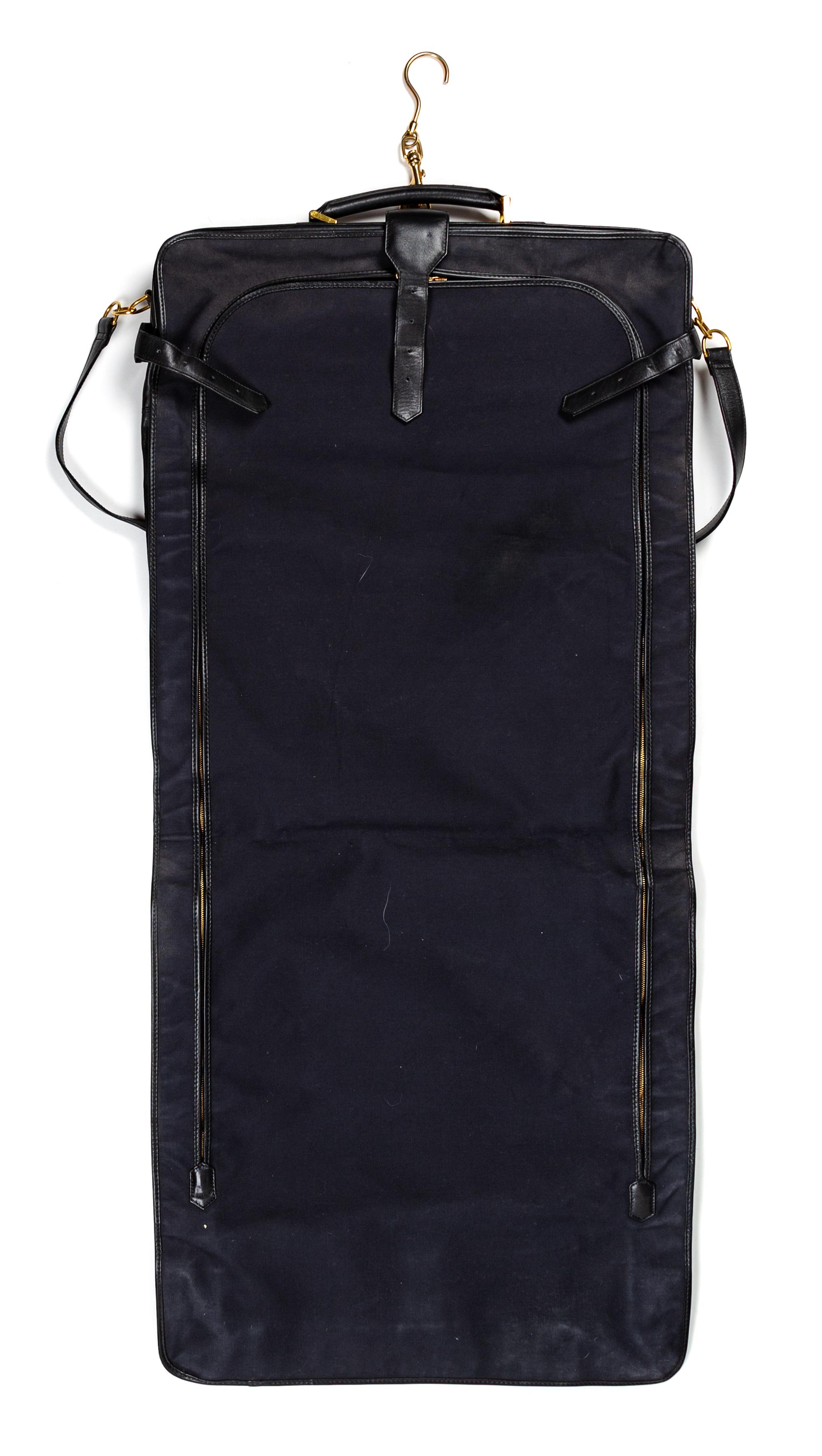 A Chanel Black Lambskin Quilted Garment Bag, 45" L x 24" W.