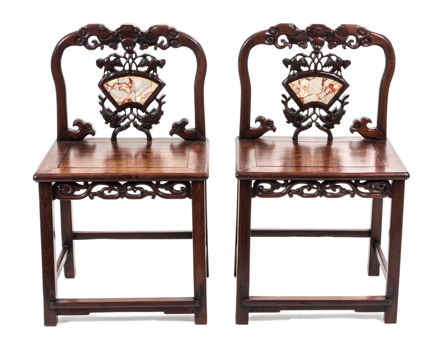 A Pair of Chinese Carved Wood Chairs Height 35 3/4 inches.