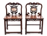 A Pair of Chinese Carved Wood Chairs Height 35 3/4 inches.