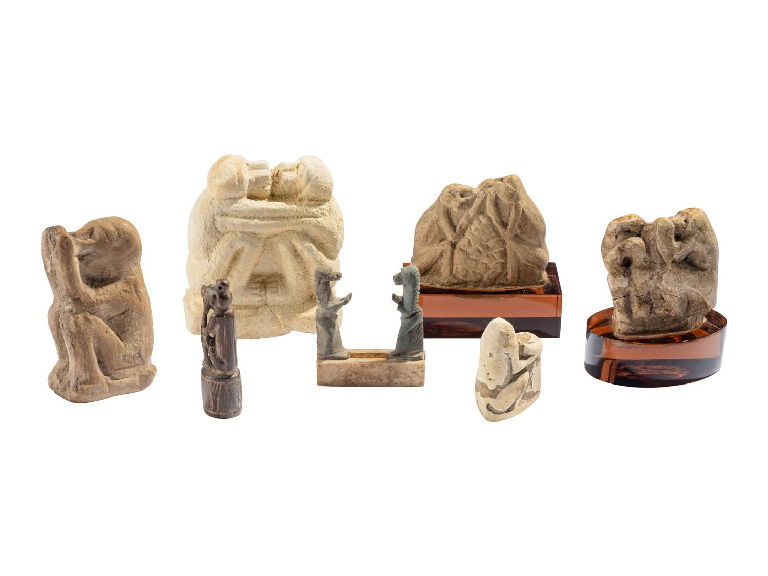 Seven Egyptian Stone and Wood Baboon Figures