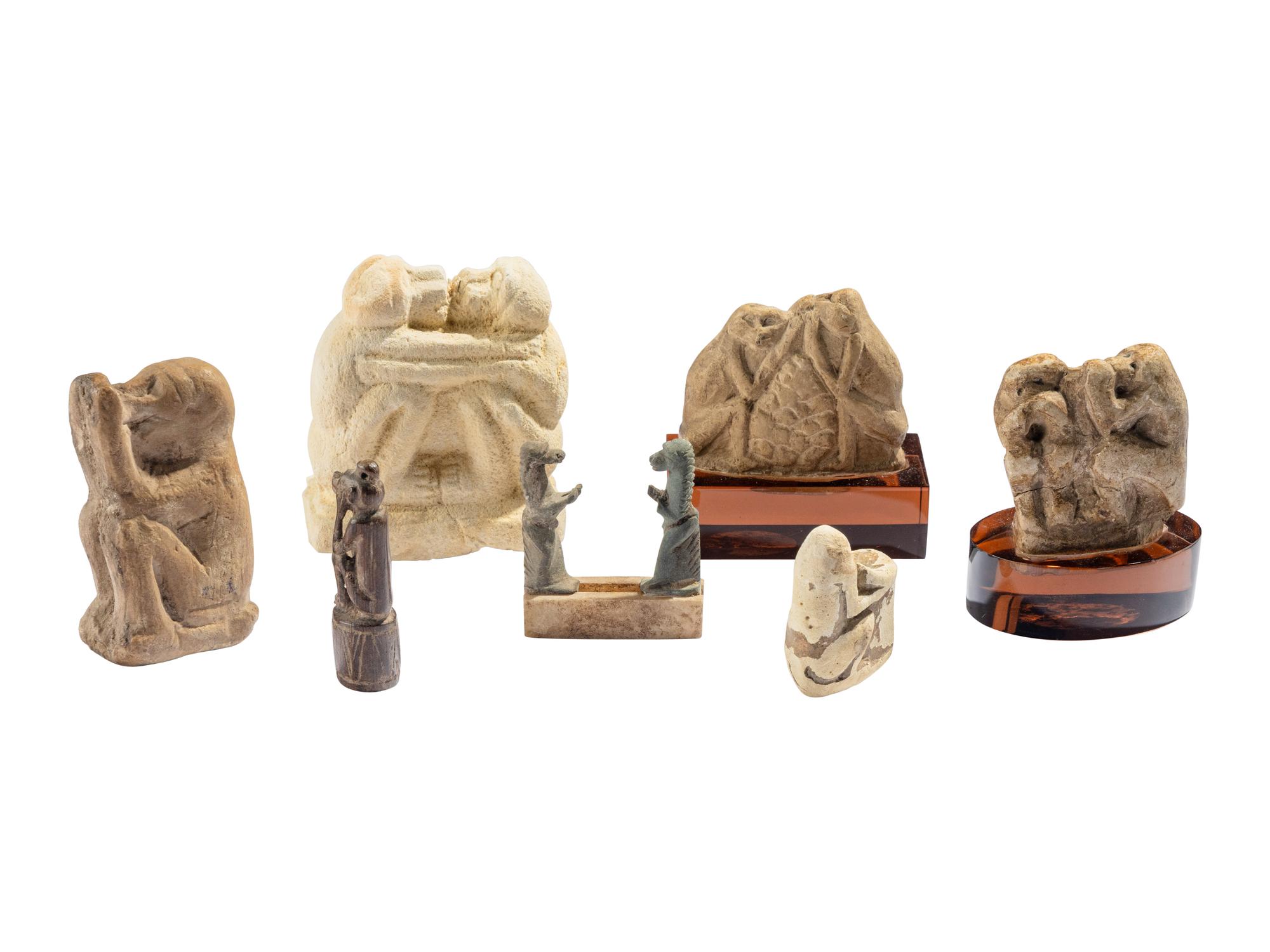 Seven Egyptian Stone and Wood Baboon Figures