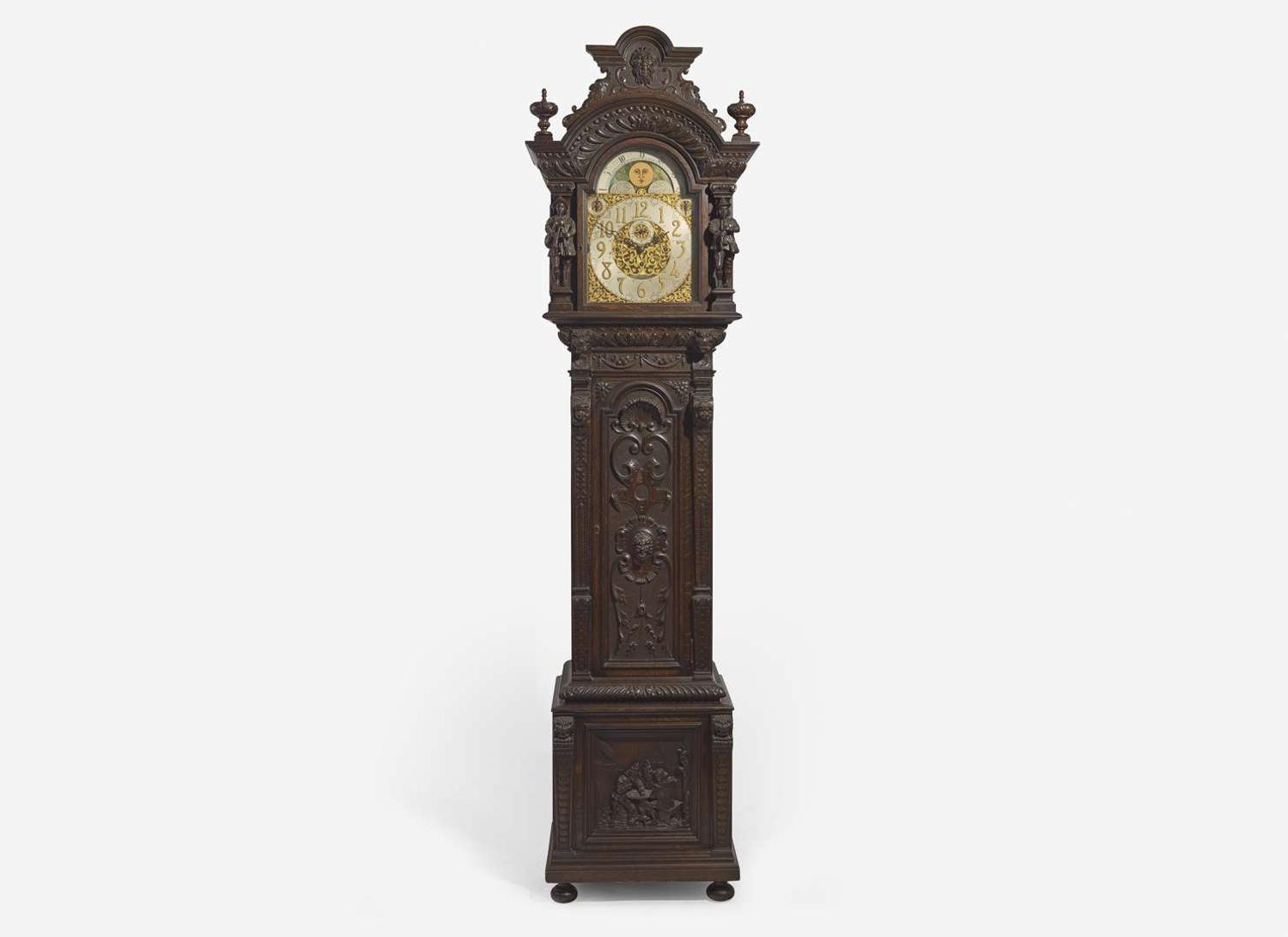 An impressive Renaissance Revival carved oak tall case clock, the case attributed to R.J. Horner & Co., New York, NY, with works by Winterhalder & Hofmeier, Schwaerzenbach, Black Forest, Germany, retailed by Tilden Thurber Co., Providence, RI, late 19th / early 20th century