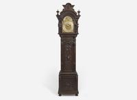 An impressive Renaissance Revival carved oak tall case clock, the case attributed to R.J. Horner & Co., New York, NY, with works by Winterhalder & Hofmeier, Schwaerzenbach, Black Forest, Germany, retailed by Tilden Thurber Co., Providence, RI, late 19th / early 20th century