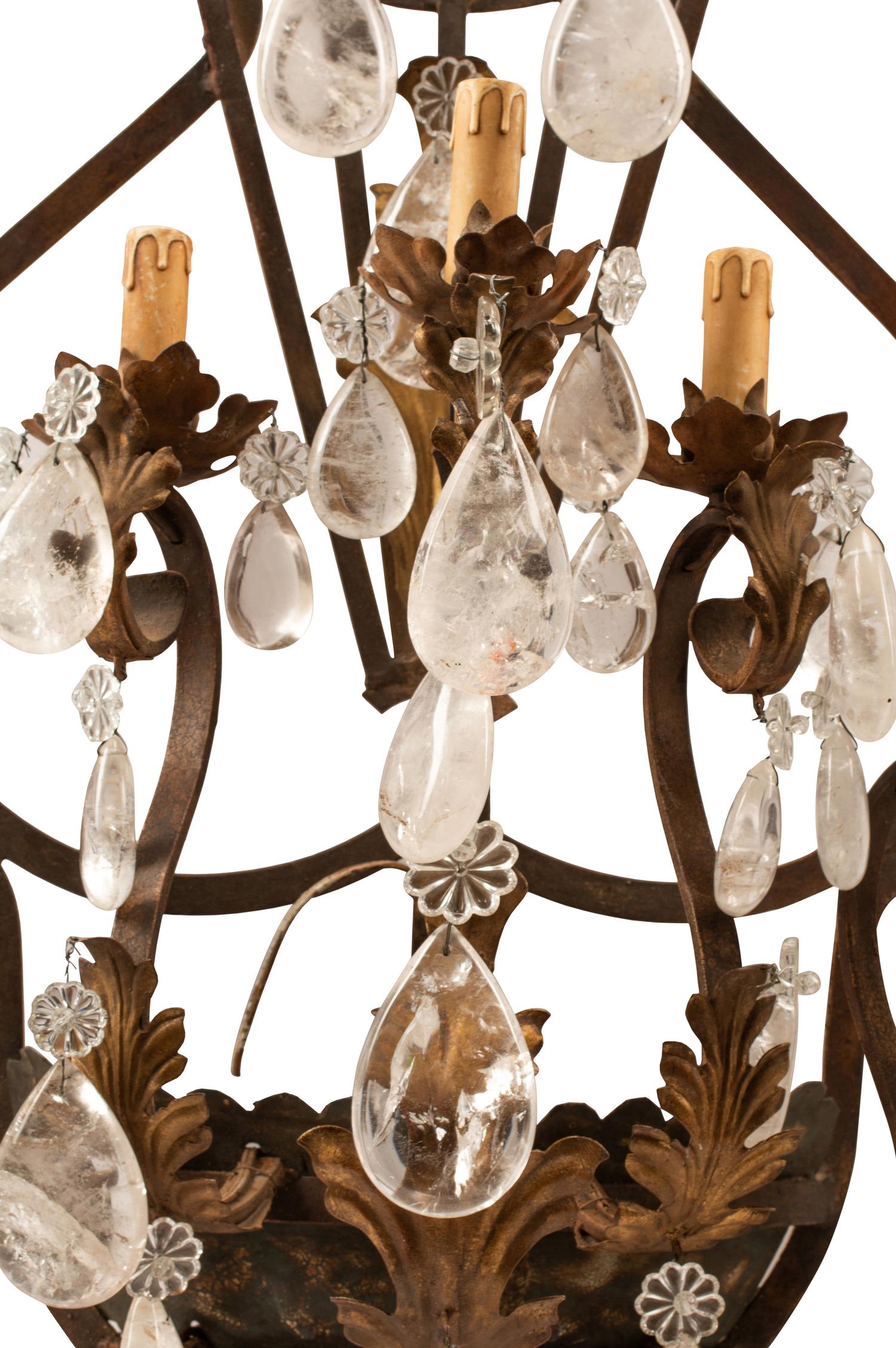 A Pair of Spanish Iron and Rock Crystal Five-Light Sconces